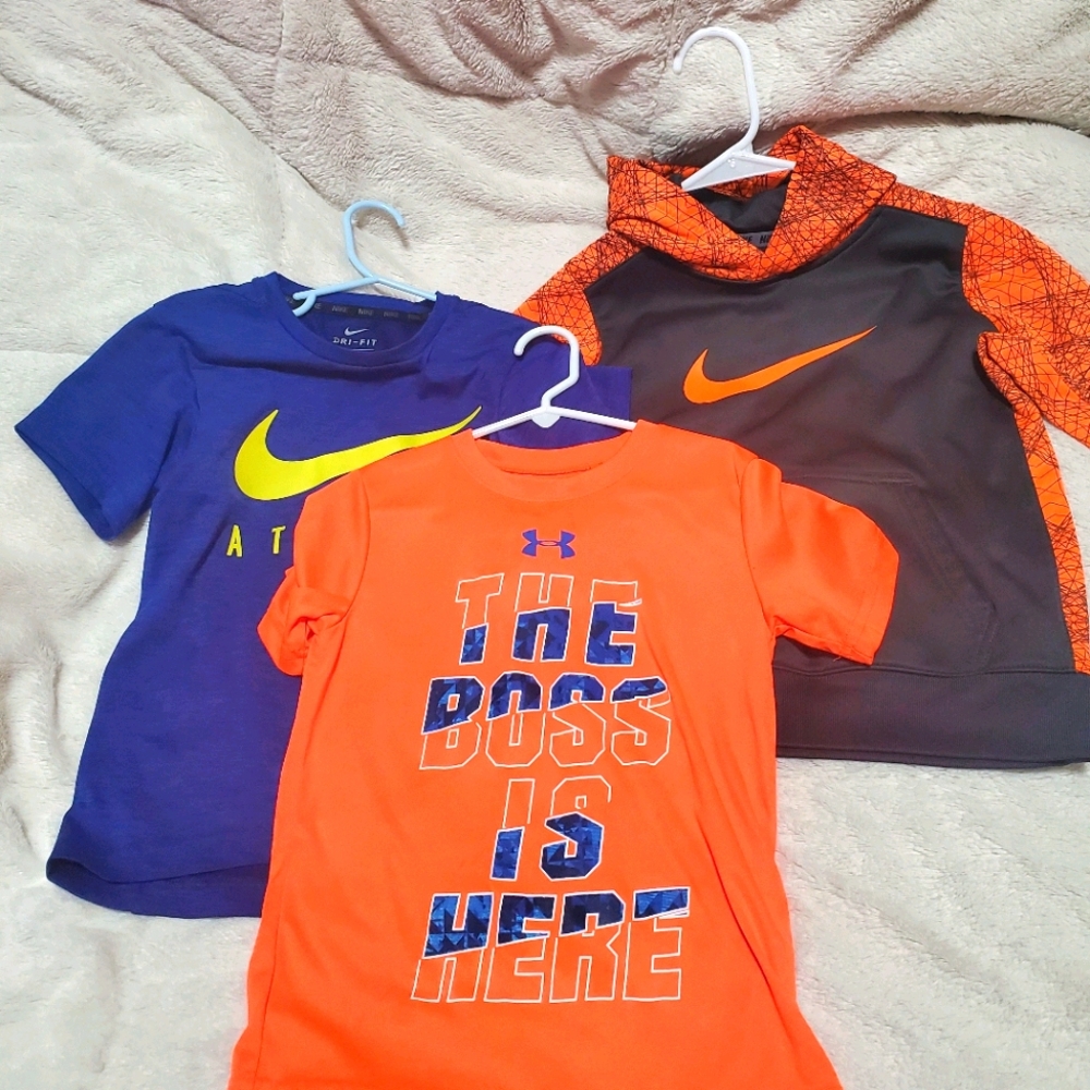 3 nike and under Armour shirts